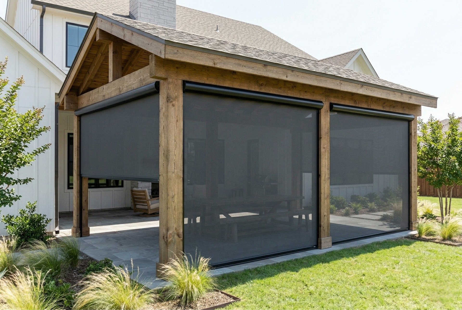 Side view of motorized patio shades on farmhouse in Argyle Texas