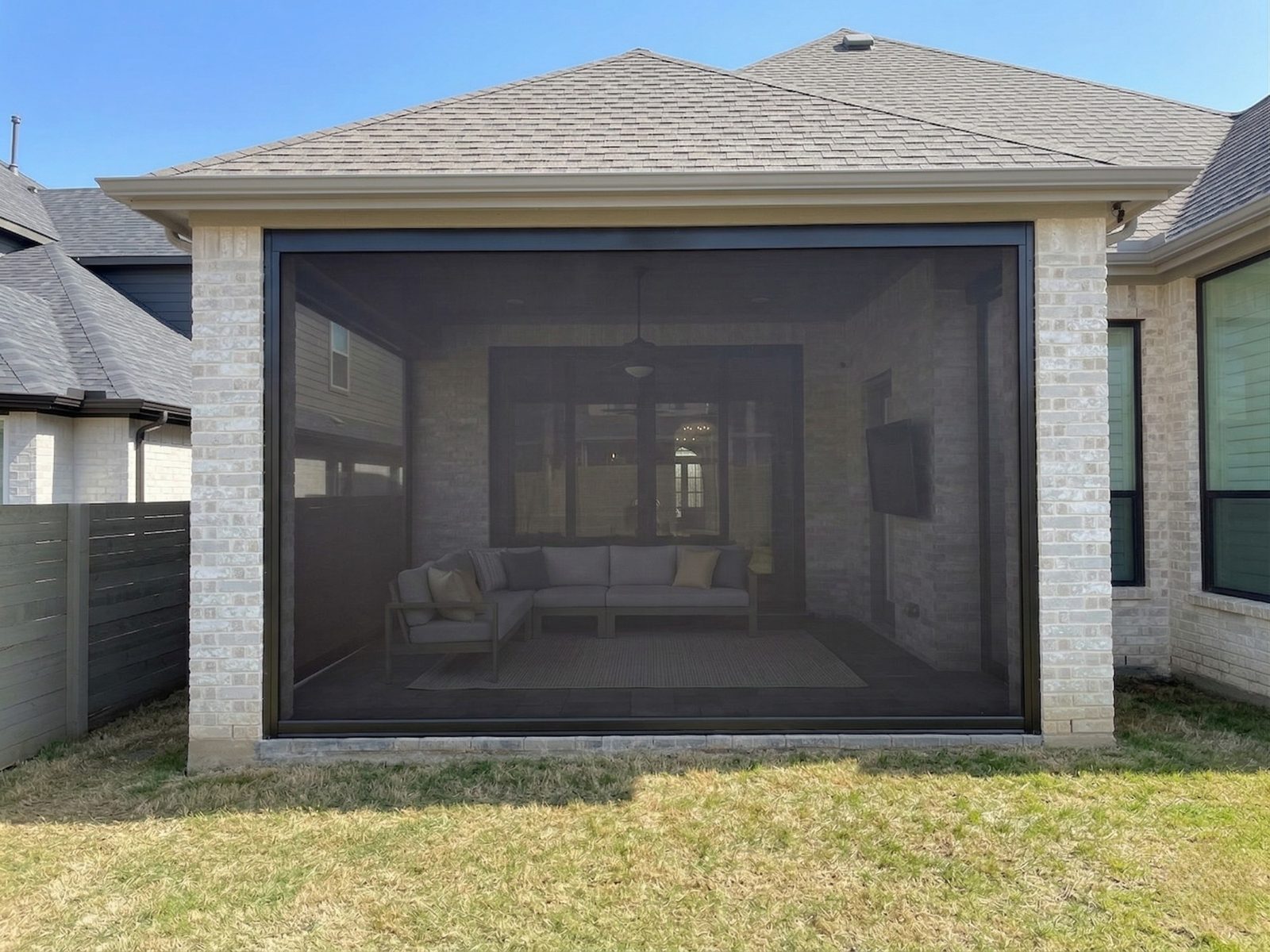 Modern mesh patio screen on home in Grapevine, Texas